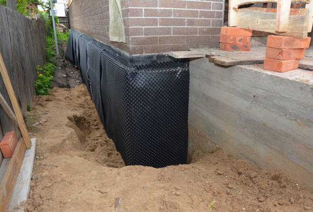 Happy homeowners after waterproofing job in Belle Mead